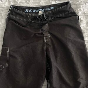 Black Board Shorts with Light Blue Stitching. Kirra size 34.